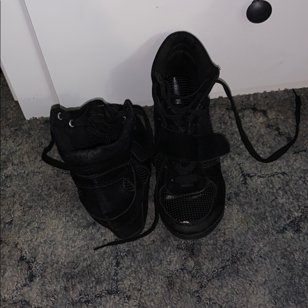 Black sneakers with hidden heels